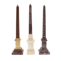 Three models of obelisks in various marbles