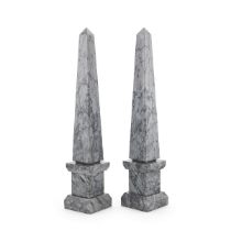 Pair of gray marble obelisks