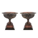 Pair of African marble stands