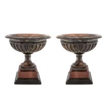 Pair of African marble stands