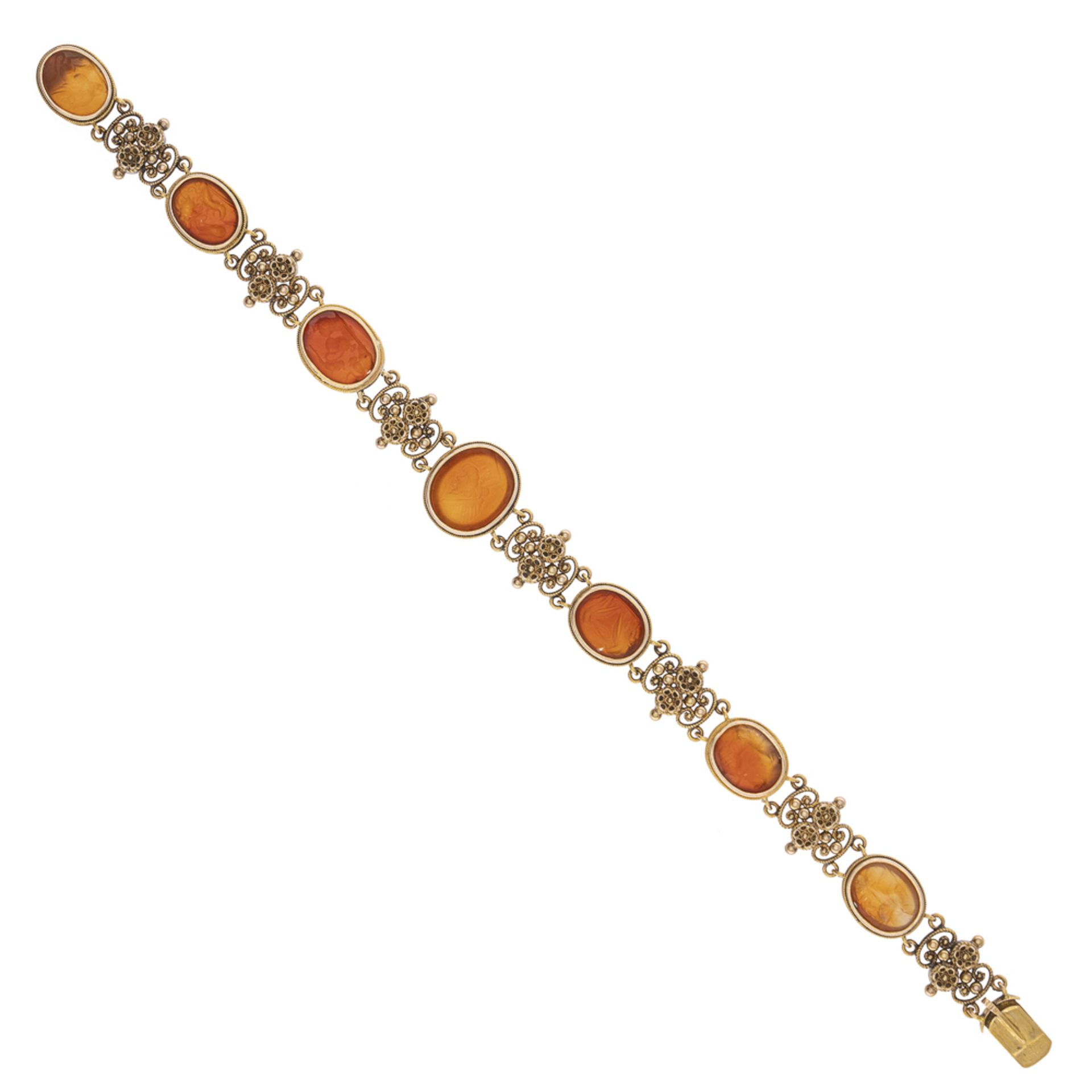 Antique 12 kt yellow gold bracelet with seven engraved carnelian plaques