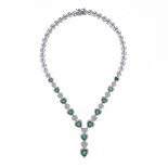 18kt white gold with emeralds and diamonds heart necklace
