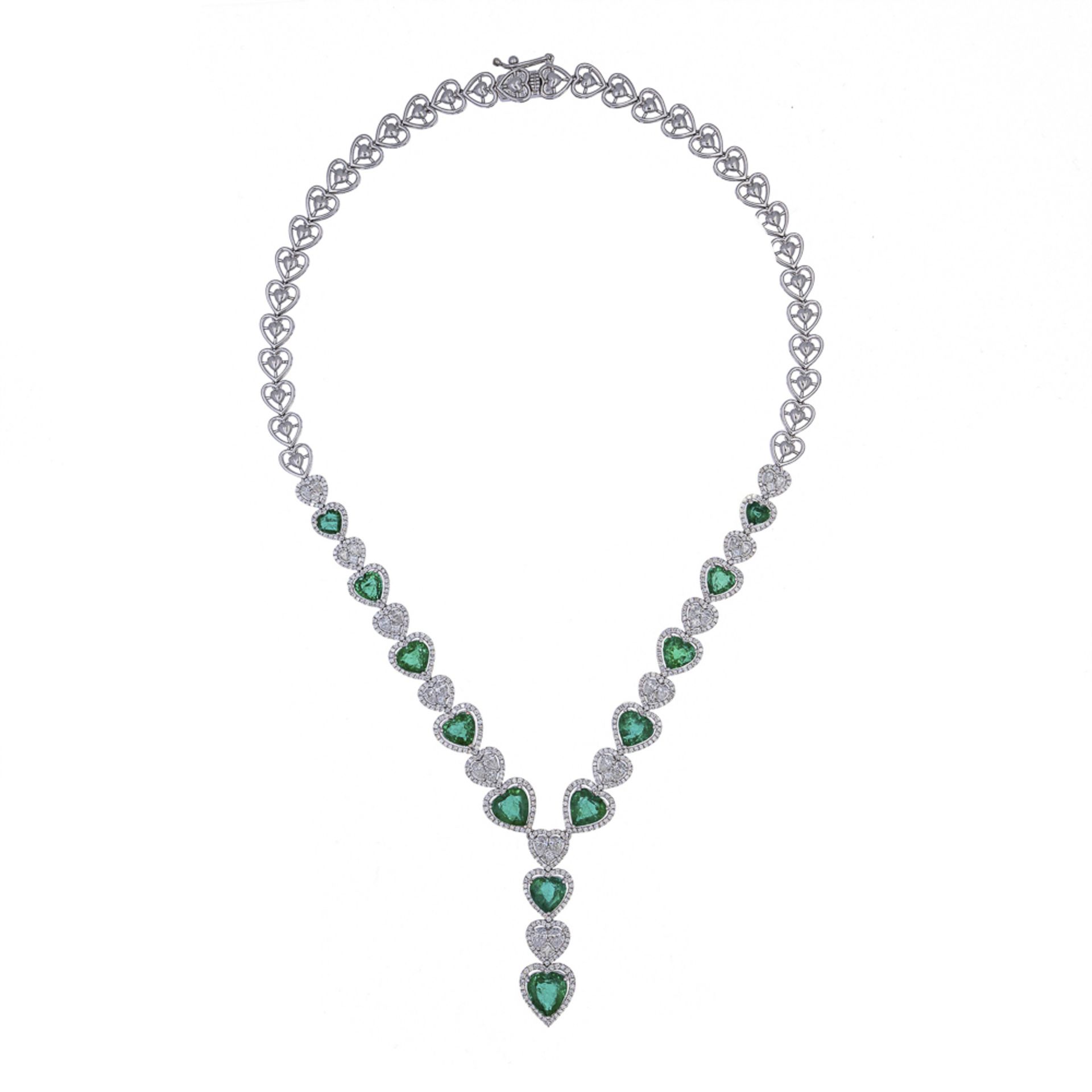 18kt white gold with emeralds and diamonds heart necklace