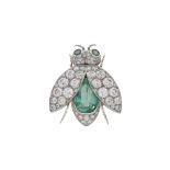 A bee brooch in natural Columbian emerald platinum