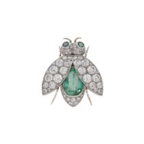 A bee brooch in natural Columbian emerald platinum