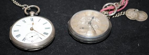 Two antique Sterling silver open face pocket watches requiring attention