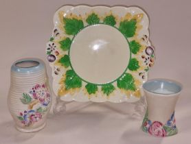 Pair of Clarice Cliff sandwich plates together with two vases (4).