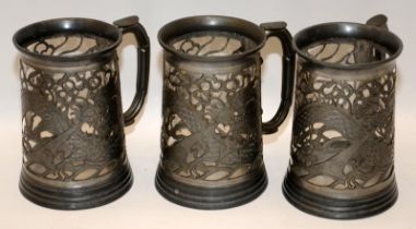 3 x vintage Hing Fat Hong Kong glass lined pewter tankards with pierced dragon decoration. 14cms