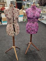 Two vintage 1960's dress makers dummies on teak tripod stands.