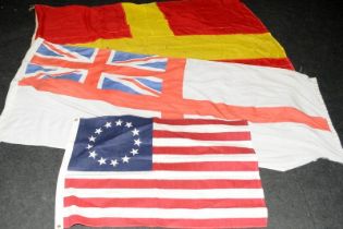 Collection of flags to include a large vintage Royal Navy White Ensign 185cms x 85, a large MOD