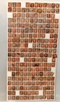 Large sheet containing a quantity of mounted Penny Reds