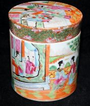 Antique Chinese Famille Rose lidded pot depicting a courtyard scene. 12cms tall. Unsigned.