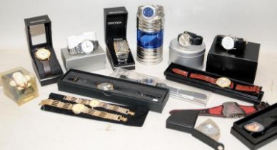 A collection of gents fashion watches requiring new batteries. Mostly boxed