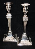 Pair of imposing silver plated candlesticks in Georgian neo-classical style, 33cms tall