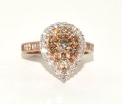 A 9ct gold ring set with Champagne diamond/white diamond centre stone approx 0.25 point ,Size O