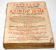 Antique book written in Latin: 'Speculum Amoris et Doloris in Sacratissimo Ac Divinissimo Corde