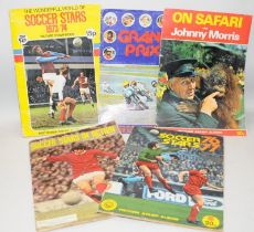 A collection of 1970's sticker albums, 3 x soccer albums, 1 x Grand Prix and On Safari with Johnny