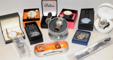A collection of gents fashion watches requiring new batteries. All boxed