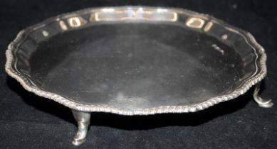 Sterling silver tray on four feet with pie crust edge. good heavy gauge. Hallmarked for Sheffield