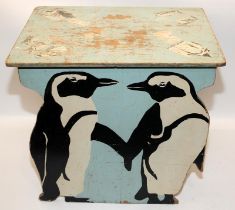 Vintage child's table decorated with penguins. Made by St Dunstan's war blinded convalescing