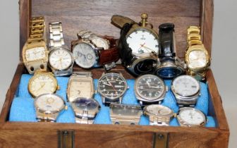 Wooden casket containing a quantity of gents fashion watches