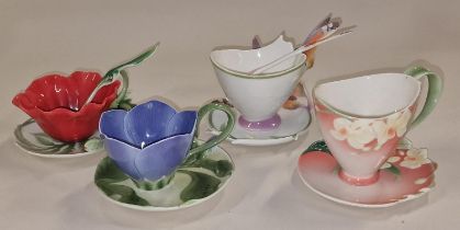 Franz Porcelain collection of decorative cups and saucers (4).