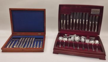 Oneida wooden canteen containing a set of stainless steel cutlery for 12 place settings together