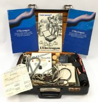 Cased vintage 1970's French Promolabo "Electro Gym" with original purchase receipt.