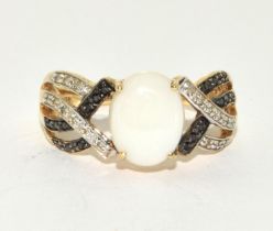 Opal/black/white diamond and 9ct gold ring Size Q