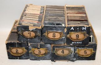 100's of antique magic lantern slides in numbered boxes. Religious texts/hymns/images. 7 boxes