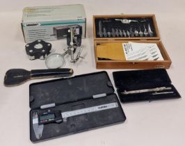 A collection of various tools and other collectables.