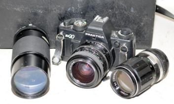 Praktica BX20 35mm SLR film camera c/w a selection of lenses in a hard case