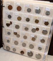 Large brown album of coins including Oman, Palestine and Poland. Includes early examples