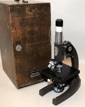 Vintage Swift scientific microscope in original wooden case