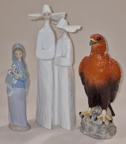 Lladro figurine of two nuns together with another Lladro figurine and a Beswick eagle decanter (3).