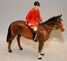 Vintage Beswick Huntsman figure on a horse. 22cms tall