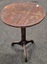 A Georgian oak wine table.