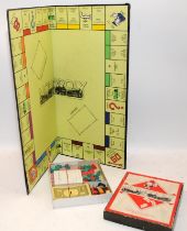 Post war austerity monopoly circa 1948, wooden houses, cardboard playing tokens. Not checked for