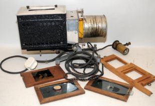 Vintage Ensign Optiscope No.8 magic lantern projector c/w original tin carry case and slide