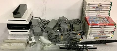 Wii CONSOLES AND ACCESSORIES. Here we find 3 Wii consoles along with leads, power supplies,