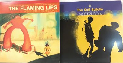 THE FLAMING LIPS ALBUMS X 2. Here we have a copy of ‘Yoshimi Battles The Pink Robots’ and ‘The