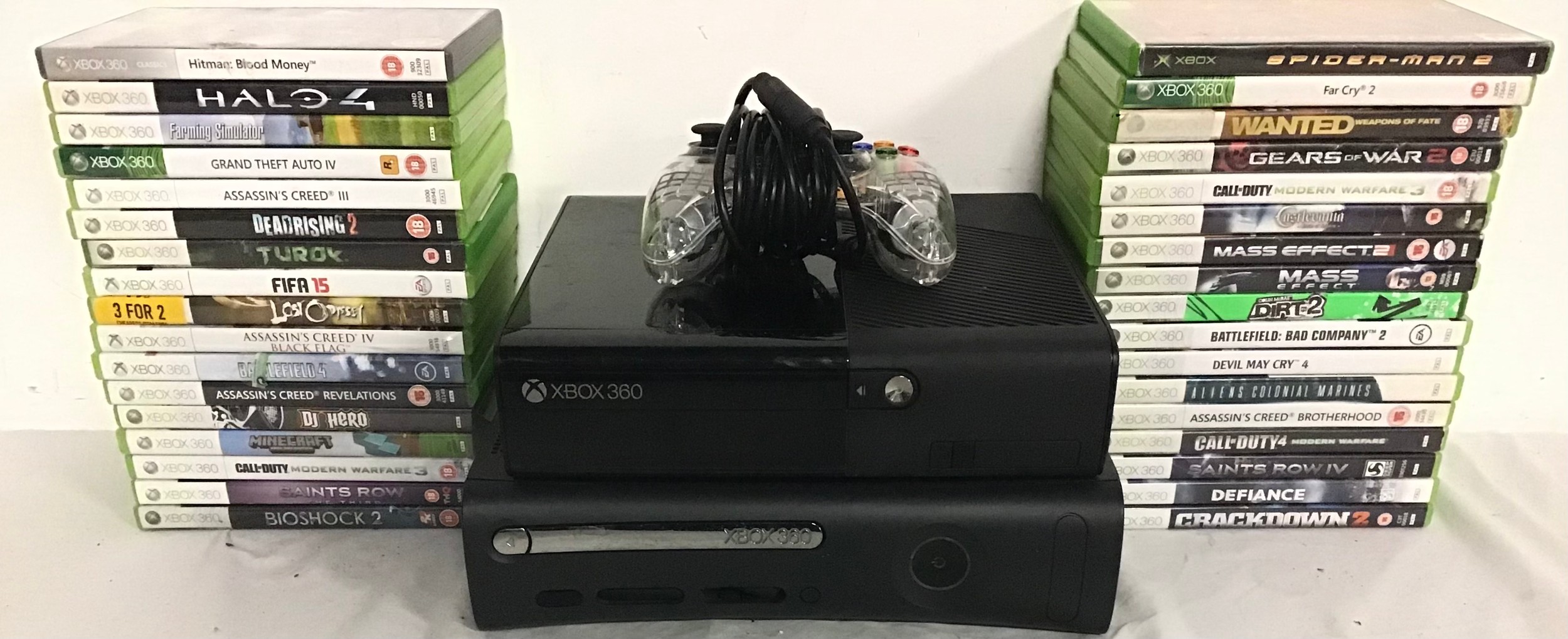 COLLECTION OF 2 X XBOX CONSOLES AND GAMES. In total we have 2 x Xbox 360 machines along with 1
