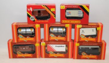 A collection of Hornby OO gauge goods wagons. 8 in lot, all boxed