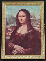 A contemporary framed print of Leonardo Da Vinci's "Mona Lisa" 80x58cm.