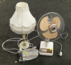 A vintage Sanyo fan, table lamp and shade and a Bush radio.