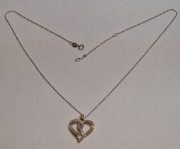 A Diamond heart pendant 9ct on a white gold 9ct chain.