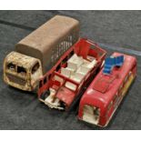 Large scale vintage tinplate vehicles to include London Transport bus. Both are in poor condition