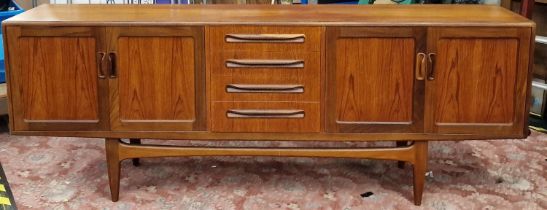 G Plan Fresco vintage teak sideboard fitted with a central bank of four drawers and two double width