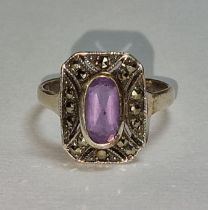 A 925 PAL silver and amethyst marcasite ring Size S