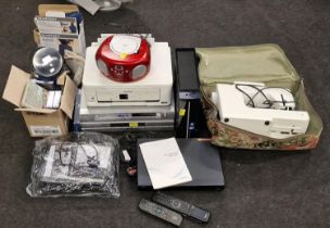 Large collection of miscellaneous electronics to include CD/DVD players, sewing machine, desktop